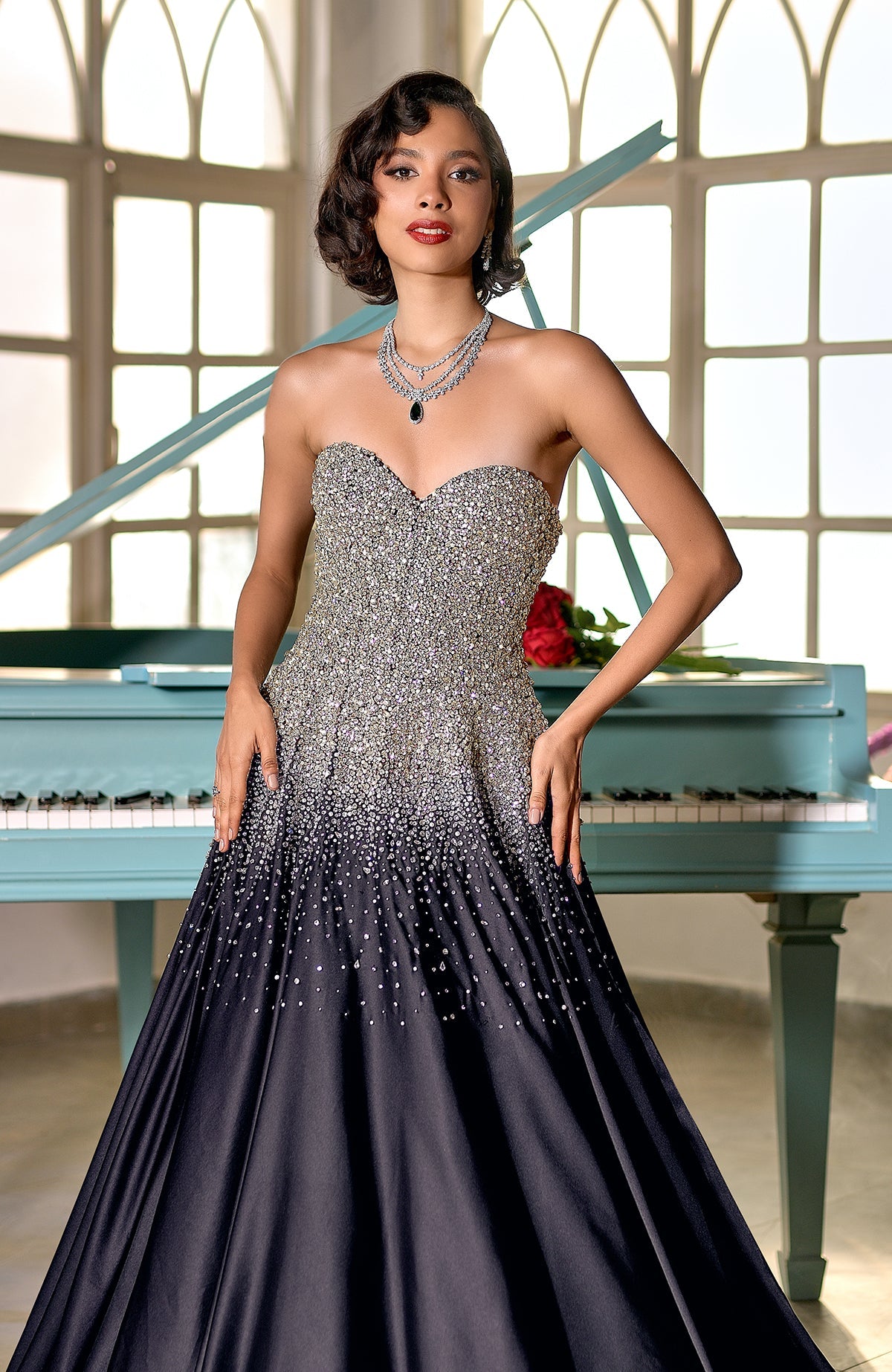 Midnight blue princess gown with crystal and pearl bead embroidery on satin fabric.
