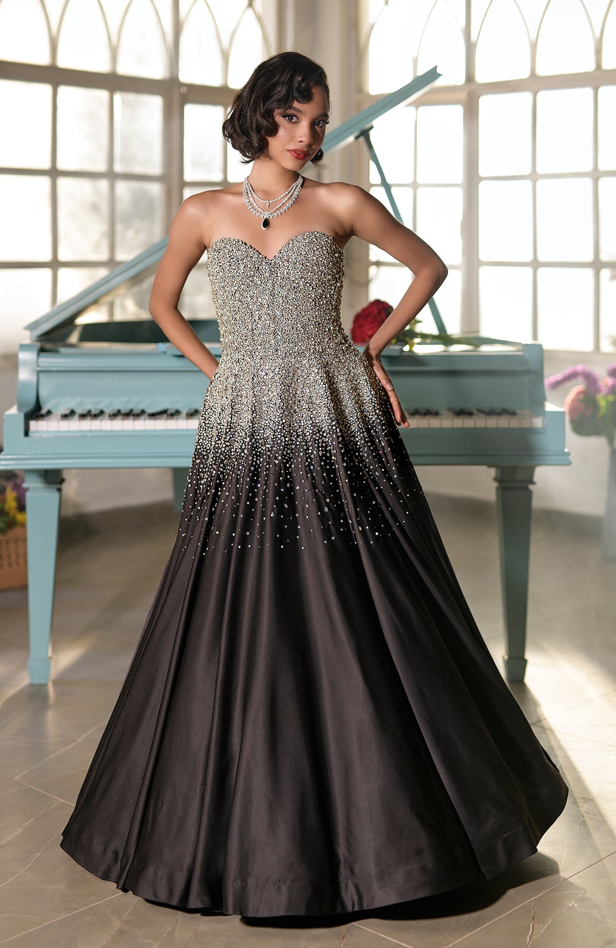 Midnight blue princess gown with crystal and pearl bead embroidery on satin fabric.