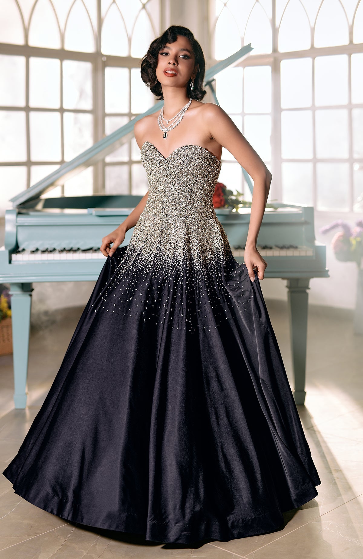 Midnight blue princess gown with crystal and pearl bead embroidery on satin fabric.