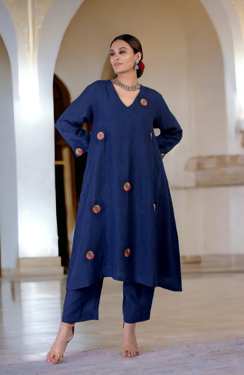 Navy blue linen kurta set with colorful Kashidakari embroidery.