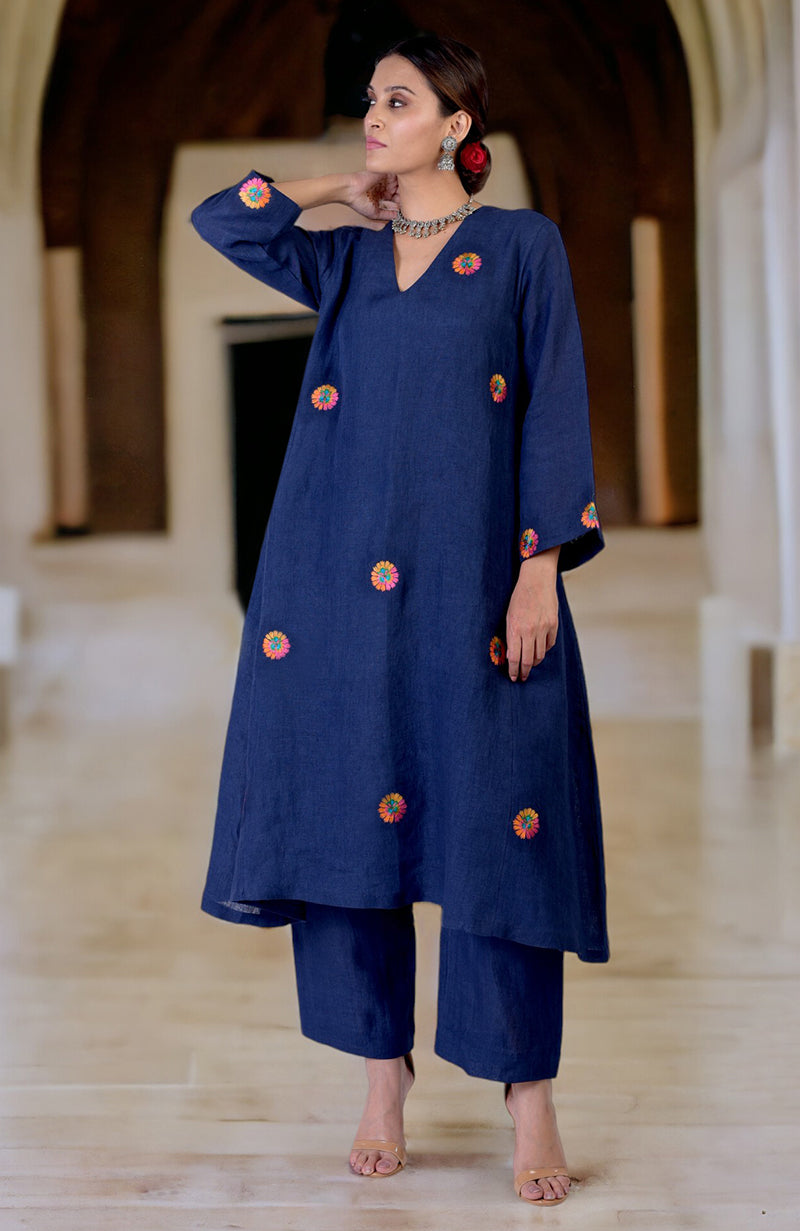 Navy blue linen kurta set with colorful Kashidakari embroidery.