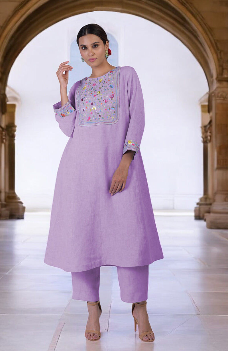 Lilac linen kurta set with colorful Parsi Gara embroidery on the neckline and sleeves.