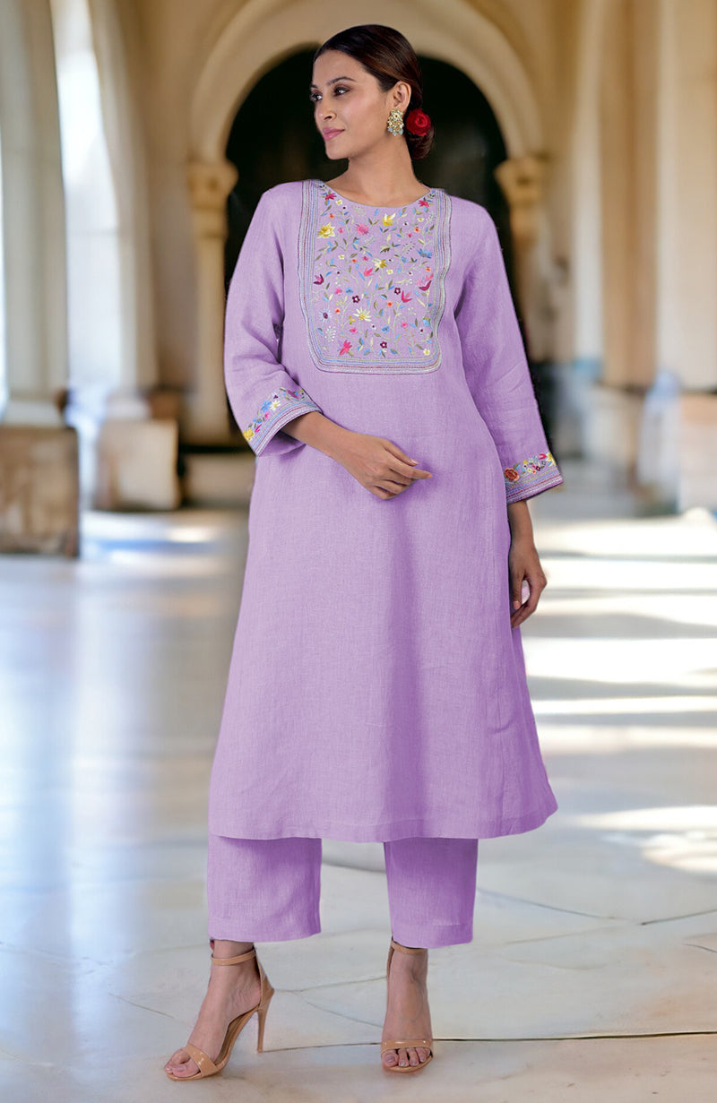 Lilac linen kurta set with Parsi Gara embroidery on the neckline and sleeves.