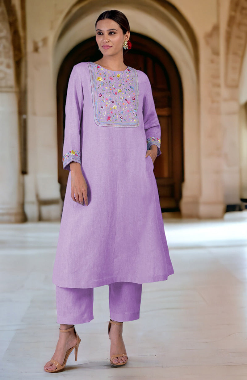 Lilac linen kurta set with Parsi Gara embroidery on the neckline and sleeves.