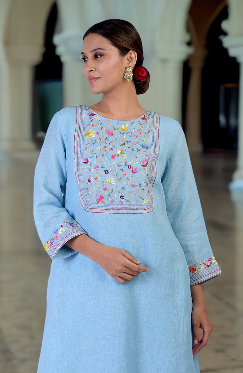 Cerulean blue linen kurta with Parsi Gara embroidery on the neckline and sleeves.