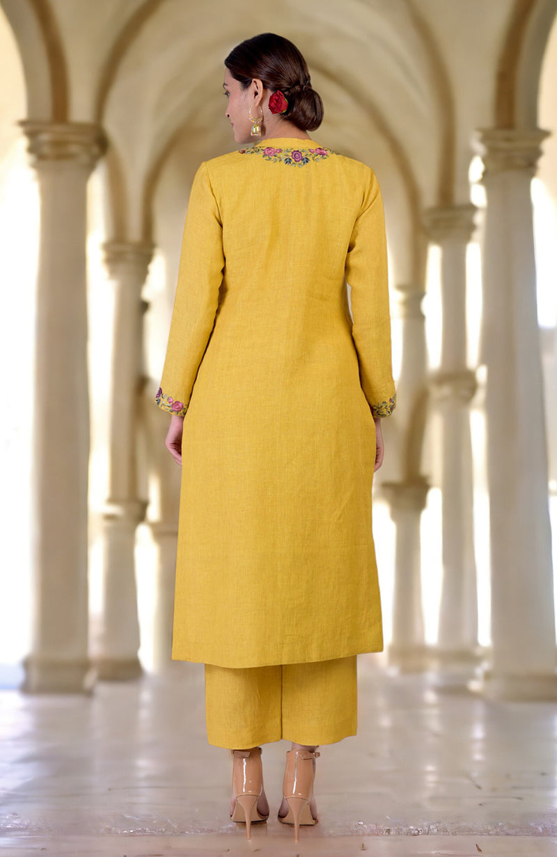 Calendula yellow linen kurta set with Parsi Gara embroidery on the neck and sleeves.