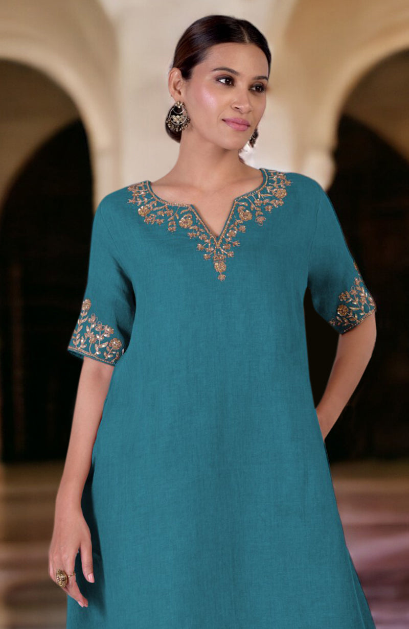 Mosaic blue linen kurta with gold marori embroidery on the neckline and sleeves.