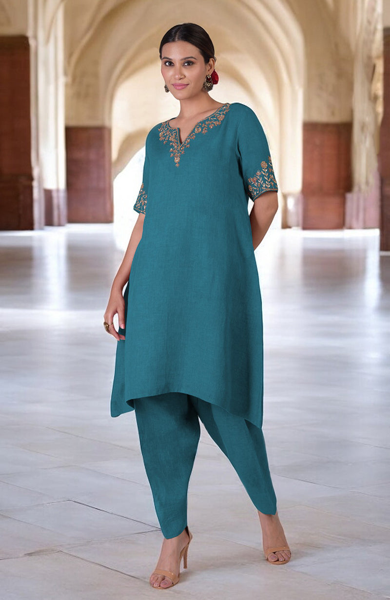 Mosaic blue linen kurta set with marori embroidery on the neckline and sleeves.
