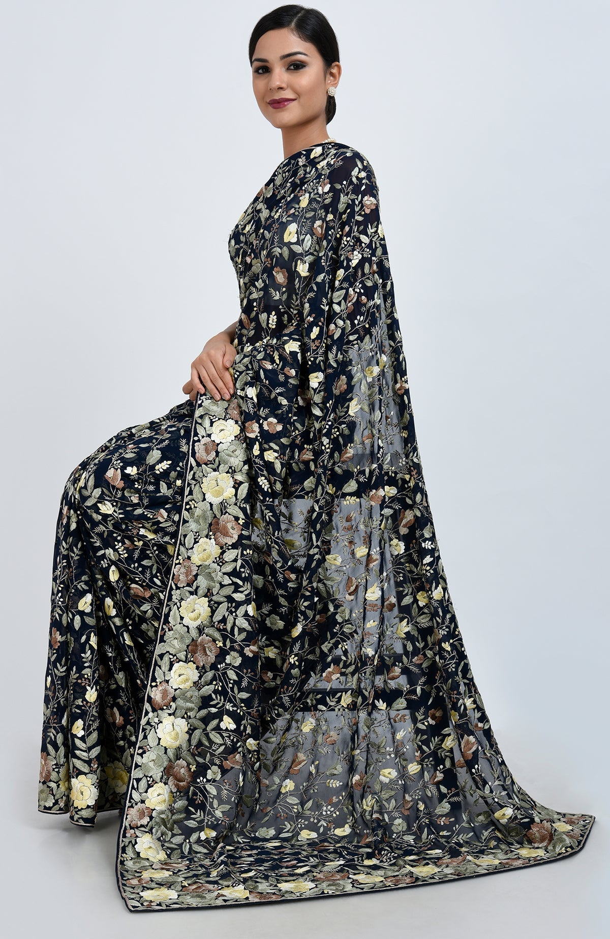Midnight blue Parsi Gara hand embroidered saree with floral jaal and gold zari work.