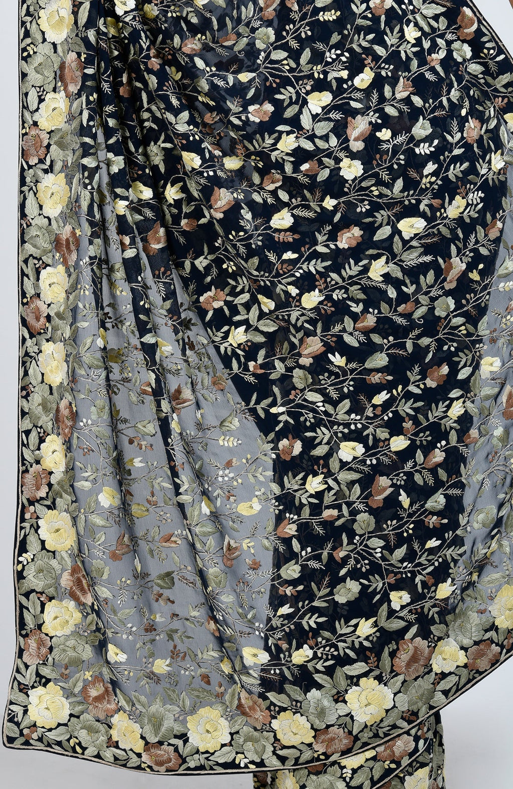 Midnight blue Parsi Gara hand-embroidered saree with floral patterns and gold zari work.