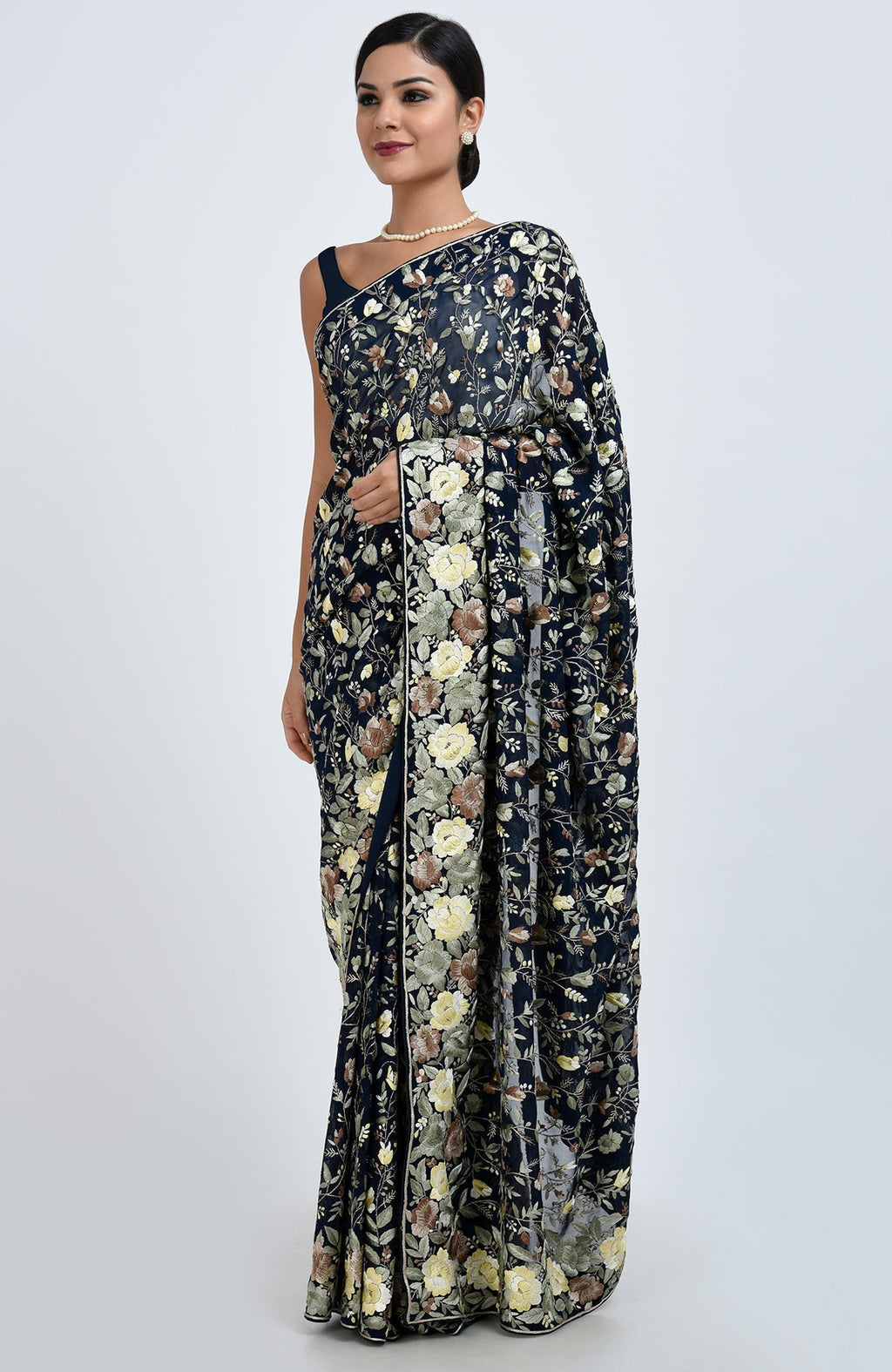 Midnight blue Parsi Gara hand embroidered saree with floral patterns.
