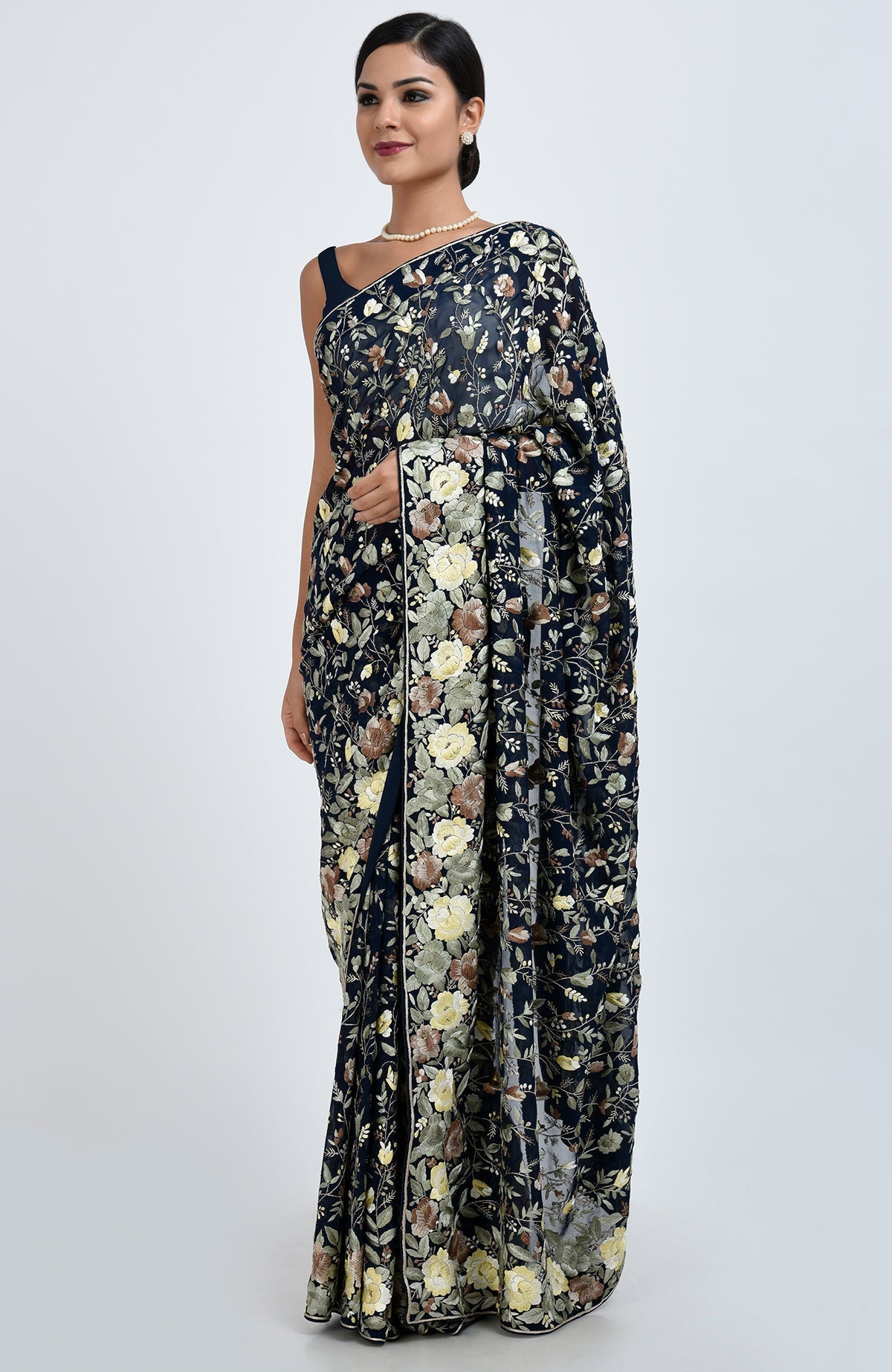 Midnight blue Parsi Gara hand embroidered saree with floral patterns.
