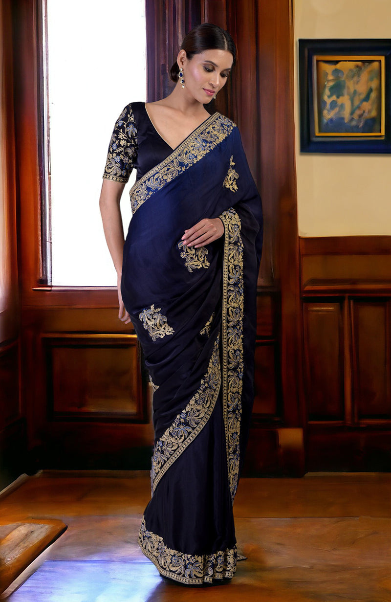 Midnight blue ombre saree with gold Kashidakari embroidery and a matching blouse.