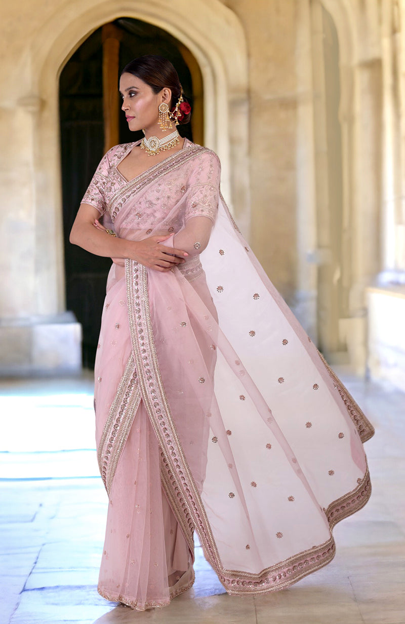 Rose pink zardozi hand-embroidered saree with a sheer pallav and raw silk blouse.