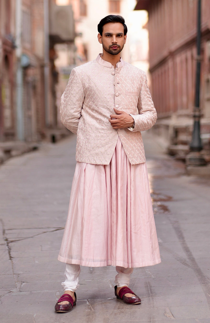 Barely pink chikankari embellished bandhgala and angarkha kurta set.