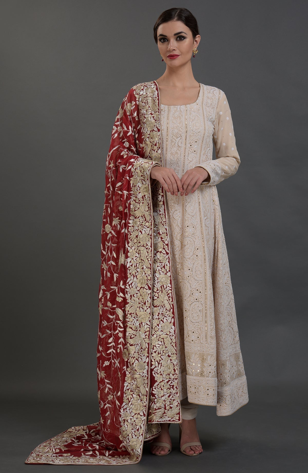 Champagne Chikankari Anarkali suit with gold kamdani work and red Parsi Gara embroidered dupatta.