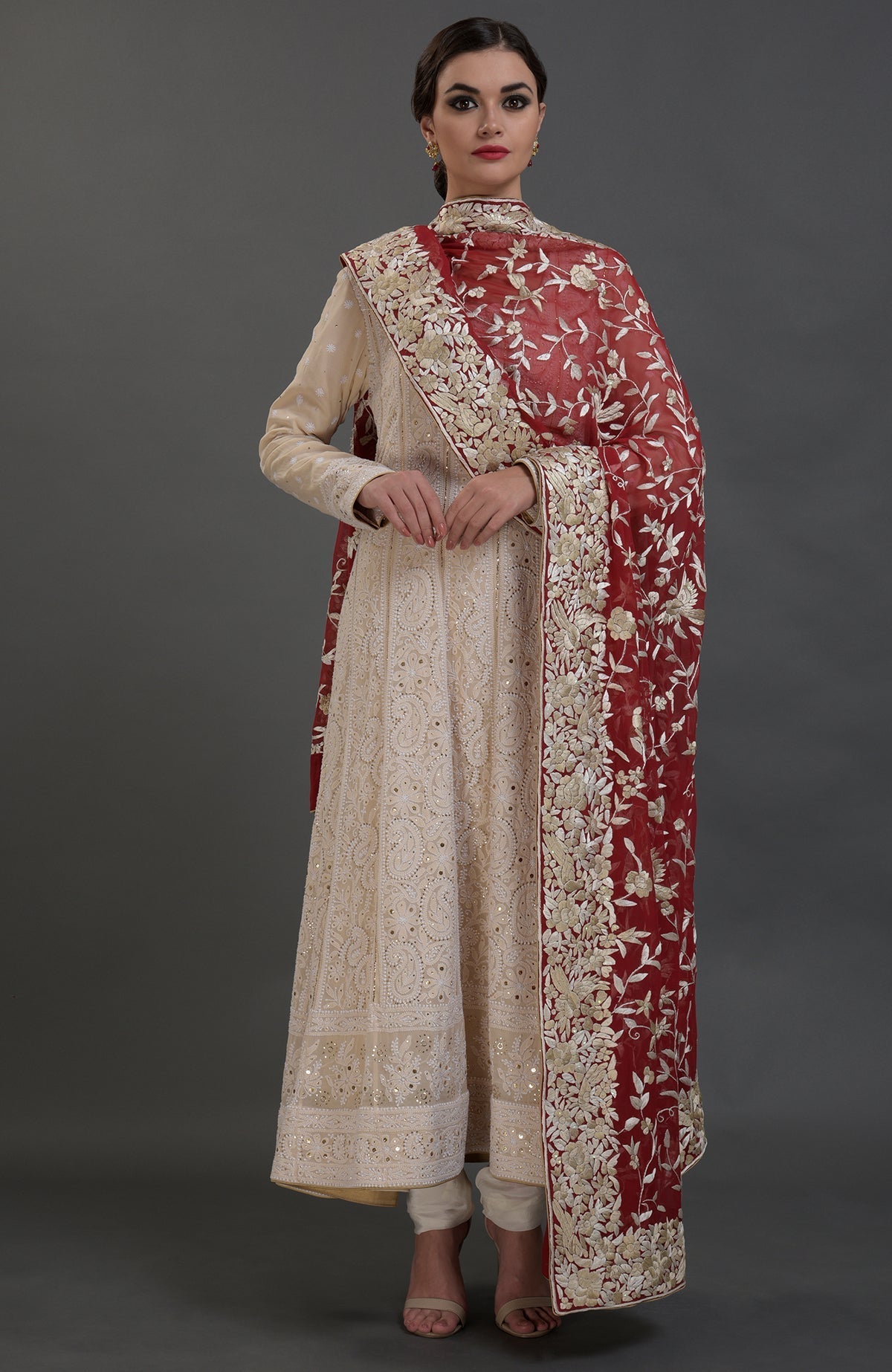 Champagne chikankari Anarkali suit with gold kamdani and red Parsi Gara embroidered dupatta.