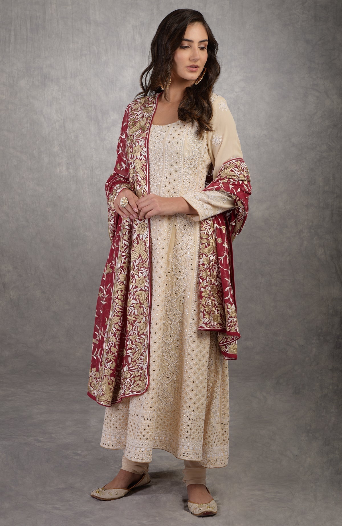 Champagne chikankari Anarkali suit with gold kamdani and red Parsi Gara embroidered dupatta.