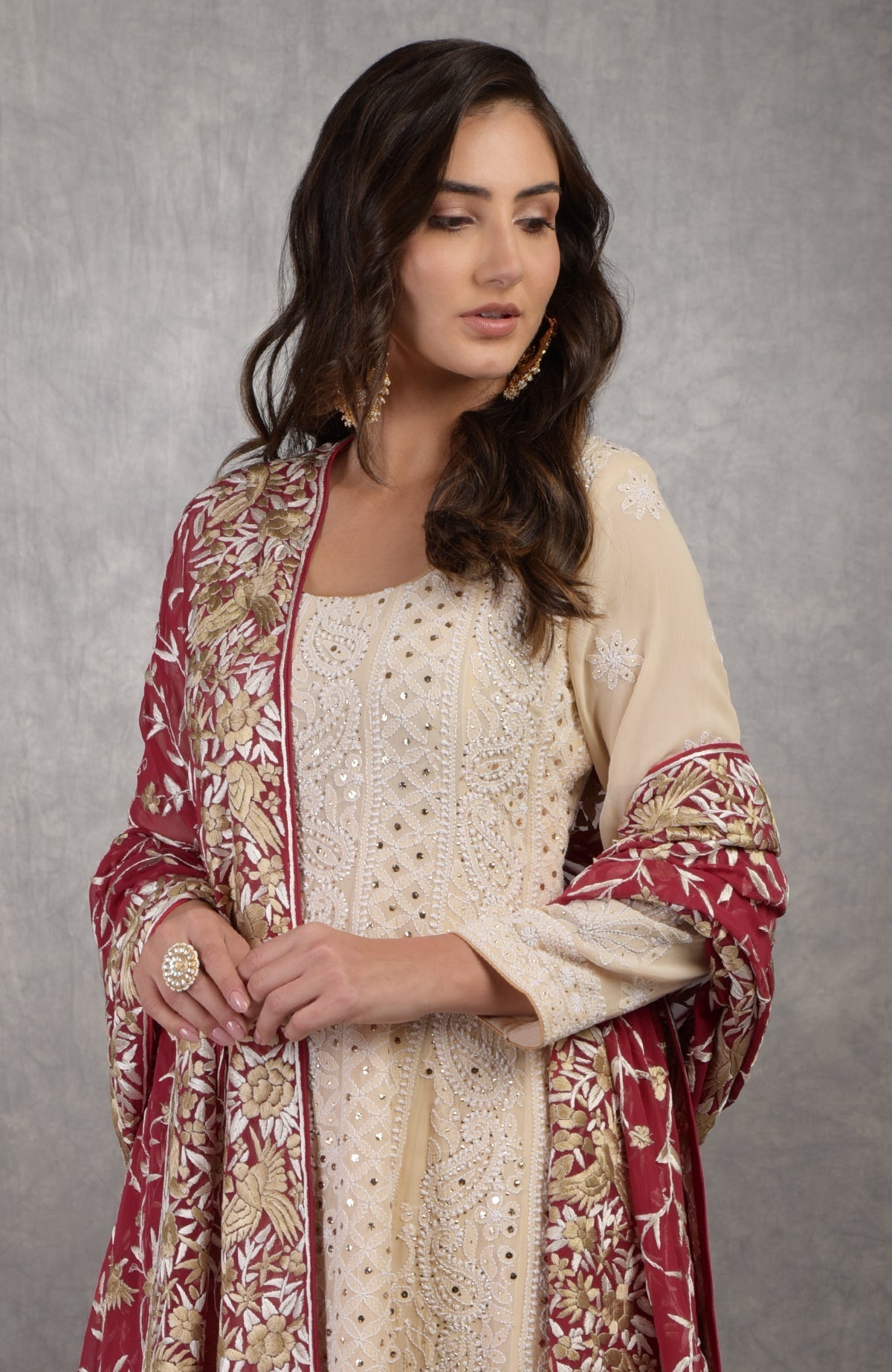 Champagne chikankari Anarkali suit with gold kamdani and red Parsi Gara embroidered dupatta.