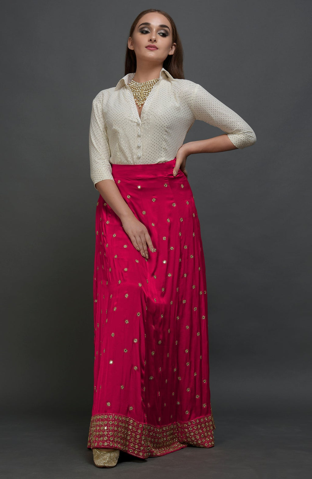 Royal red lehenga skirt with mirror and zardozi embroidery and fitted waist with side zip.