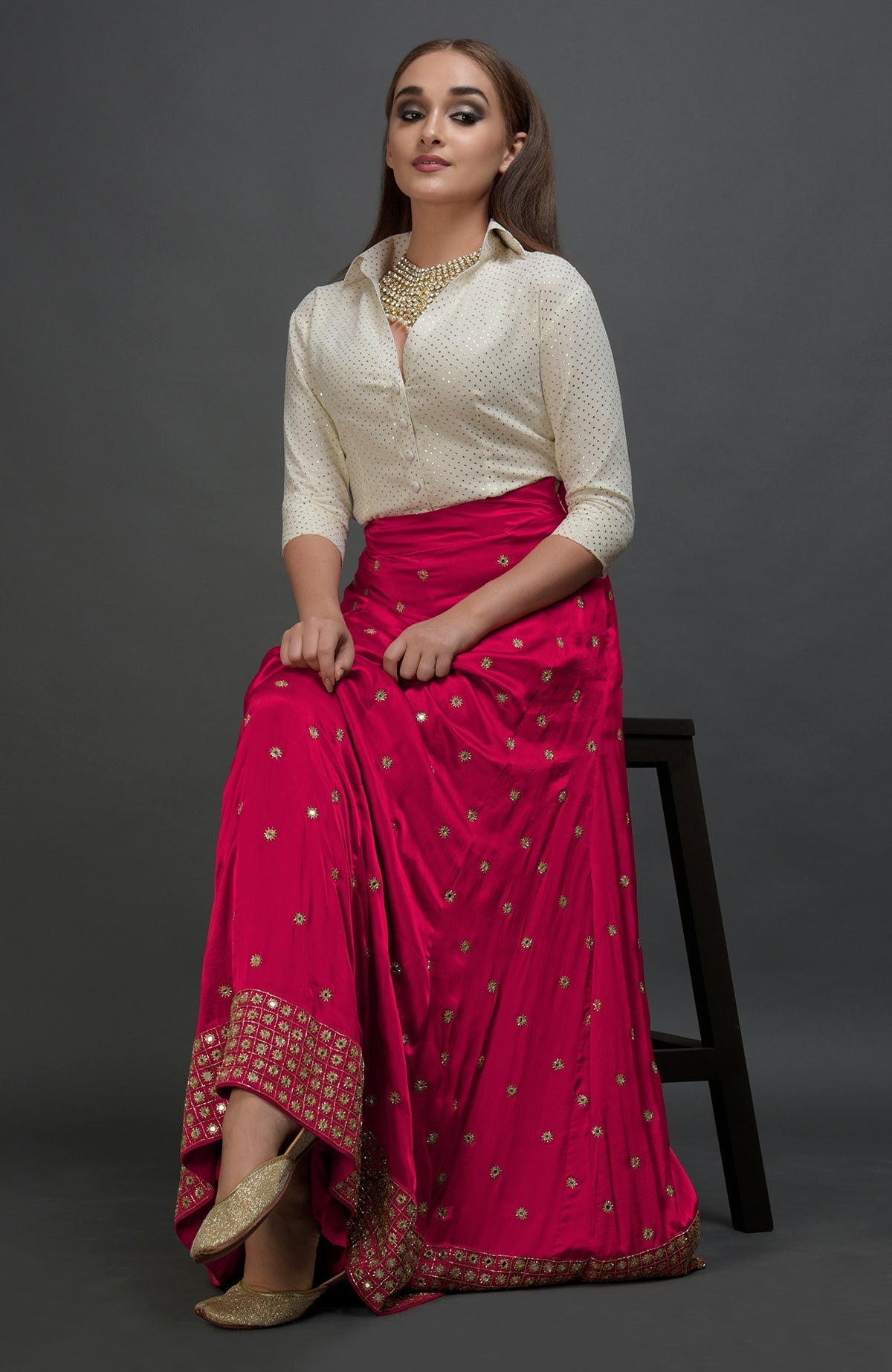 Royal red lehenga skirt with mirror and zardozi embroidery and fitted waist with side zip.