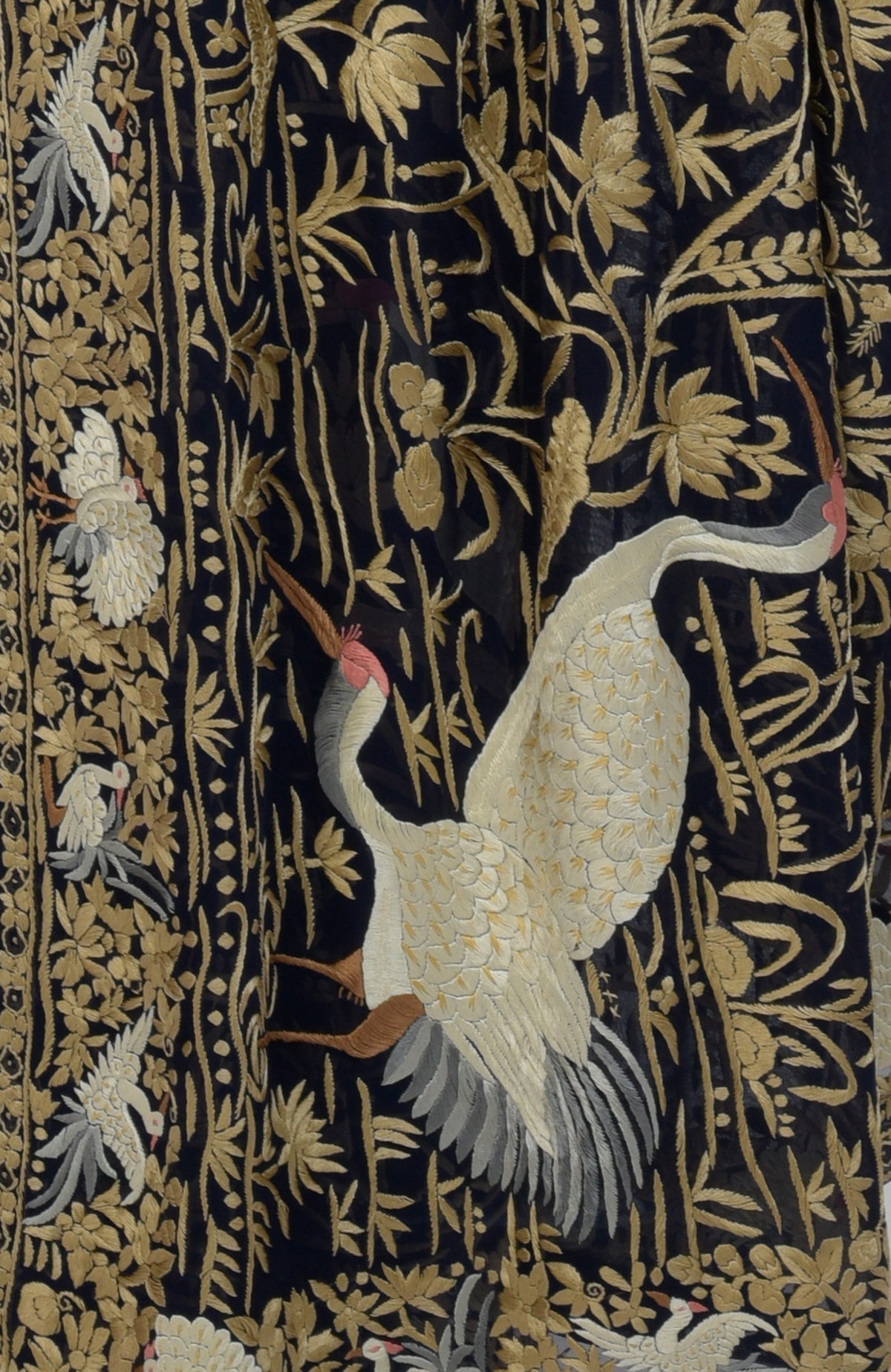 Midnight blue Parsi Gara hand-embroidered saree with crane and floral motifs.
