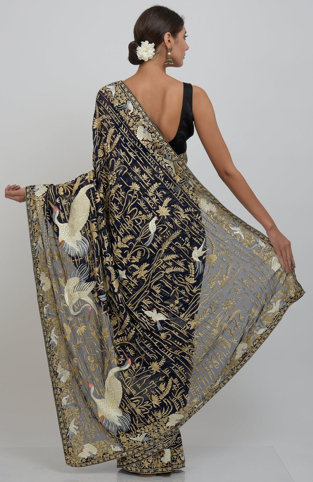 Midnight blue Parsi Gara hand-embroidered saree with crane and floral motifs.