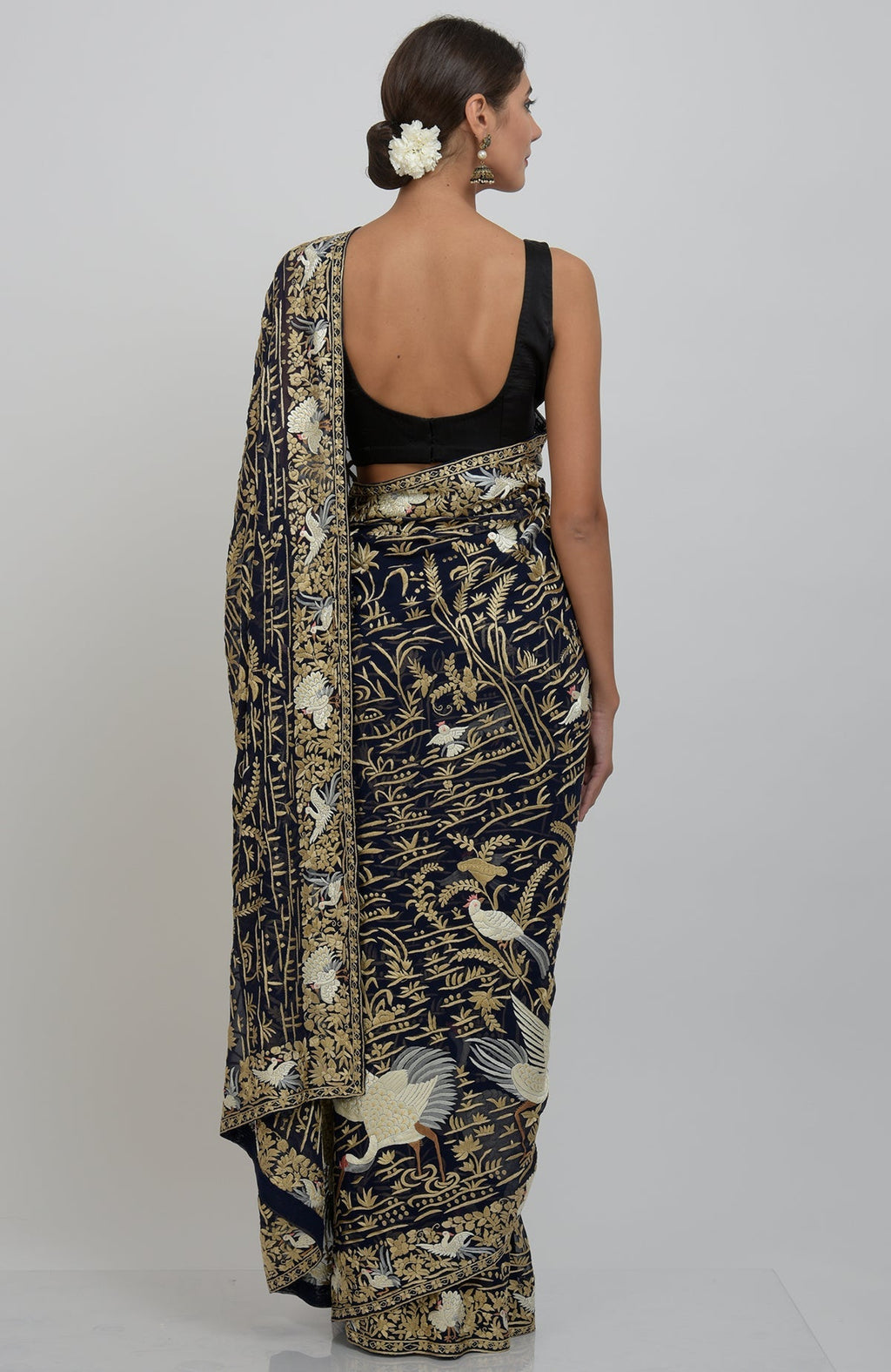 Midnight blue Parsi Gara hand-embroidered saree with bird and floral motifs.