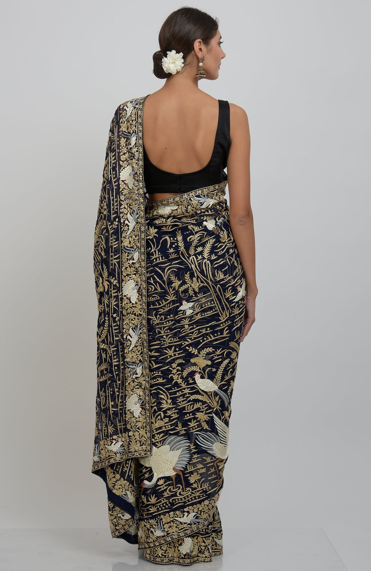 Midnight blue Parsi Gara hand-embroidered saree with bird and floral motifs.