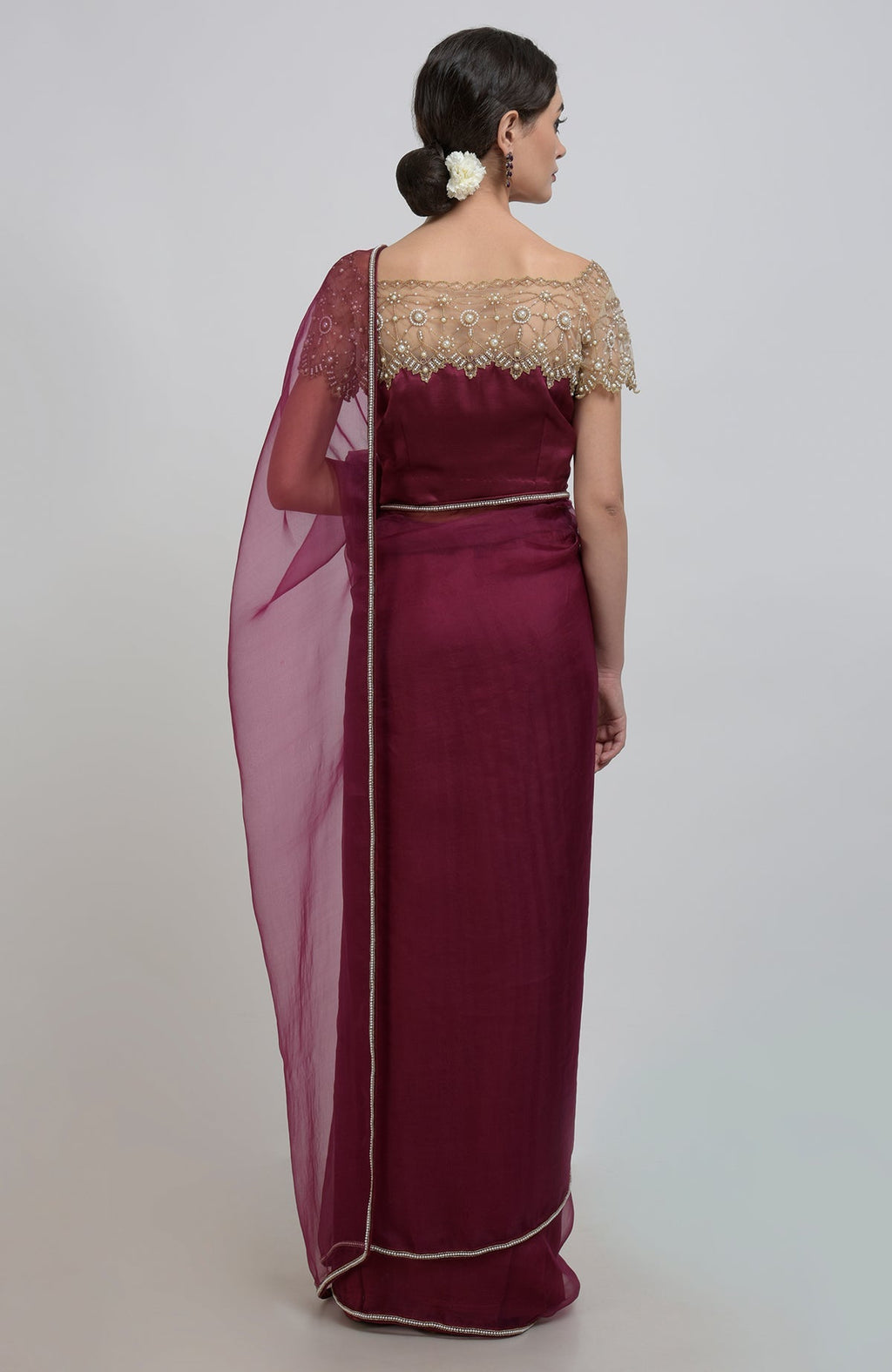 Burgundy saree with a pearl-beaded blouse and matching dupatta.