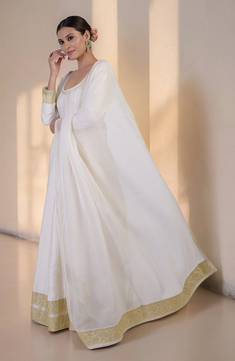 Ivory gold Banarasi handwoven Anarkali set with a matching dupatta and churidar.