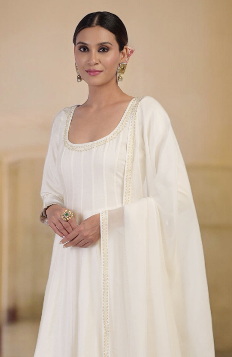 Ivory gold Banarasi handwoven Anarkali set with a scoop neck and long sleeves.