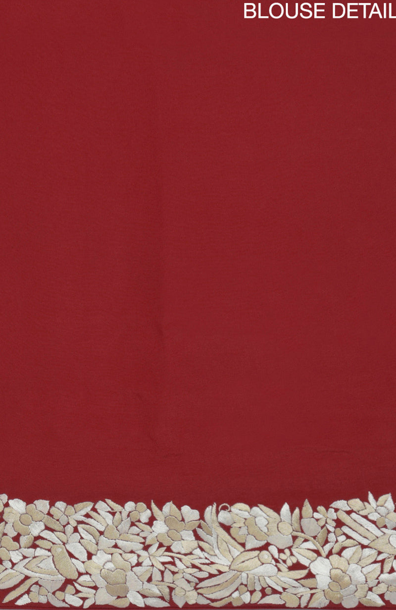 Red Parsi Gara hand embroidered saree with a floral and bird border.