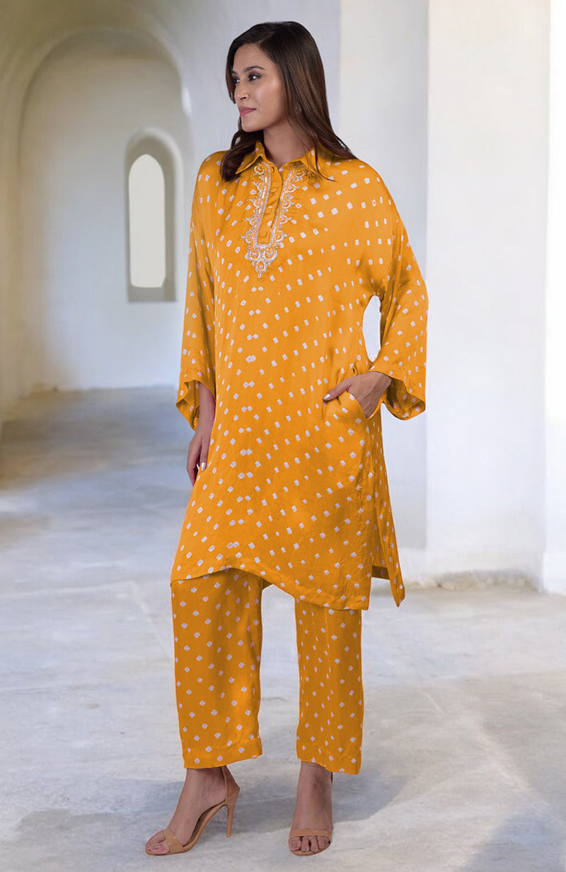 Turmeric yellow bandhej co-ord set with embroidery on the placket.