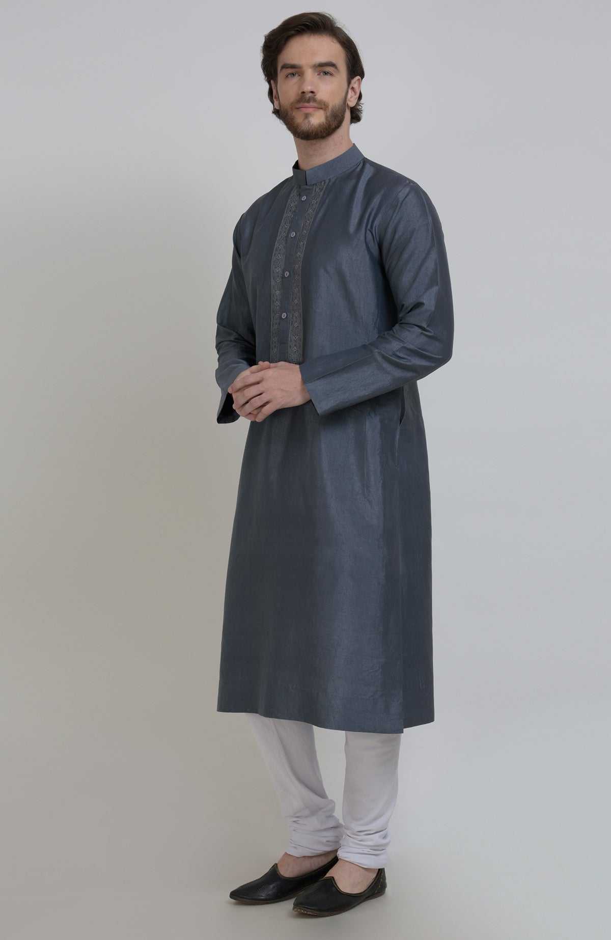 Grey silk kurta with embroidered placket detail, paired with white churidar pajamas.