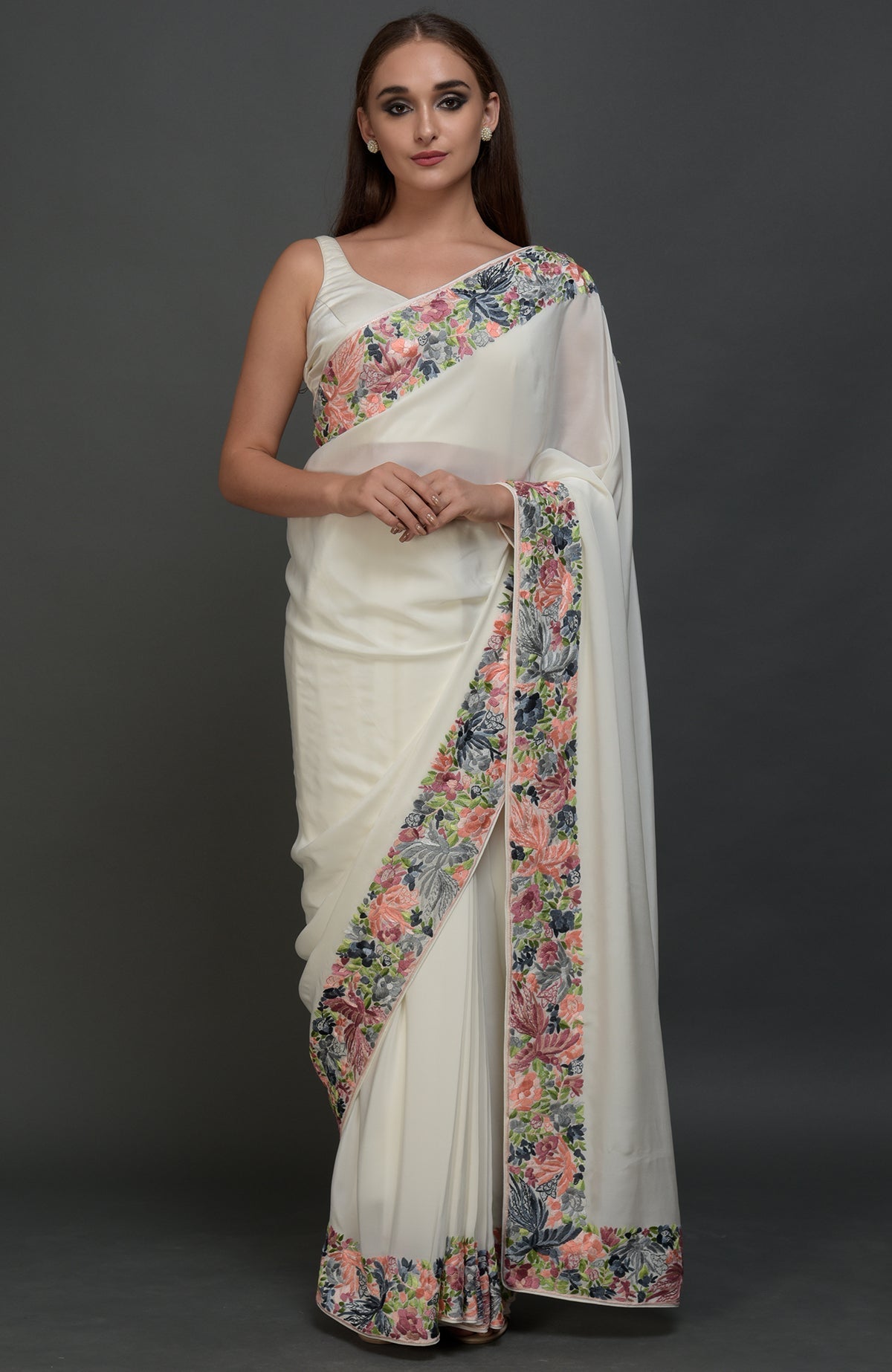 Ivory Parsi Gara hand embroidered saree with floral and bird motifs.