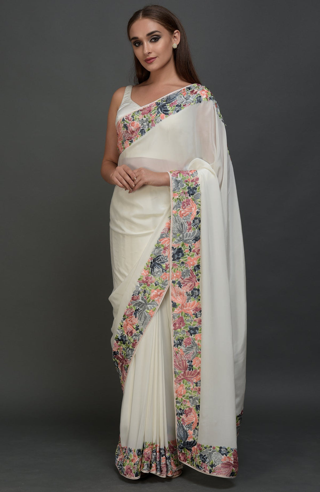 Ivory Parsi Gara hand embroidered saree with floral and bird motifs.