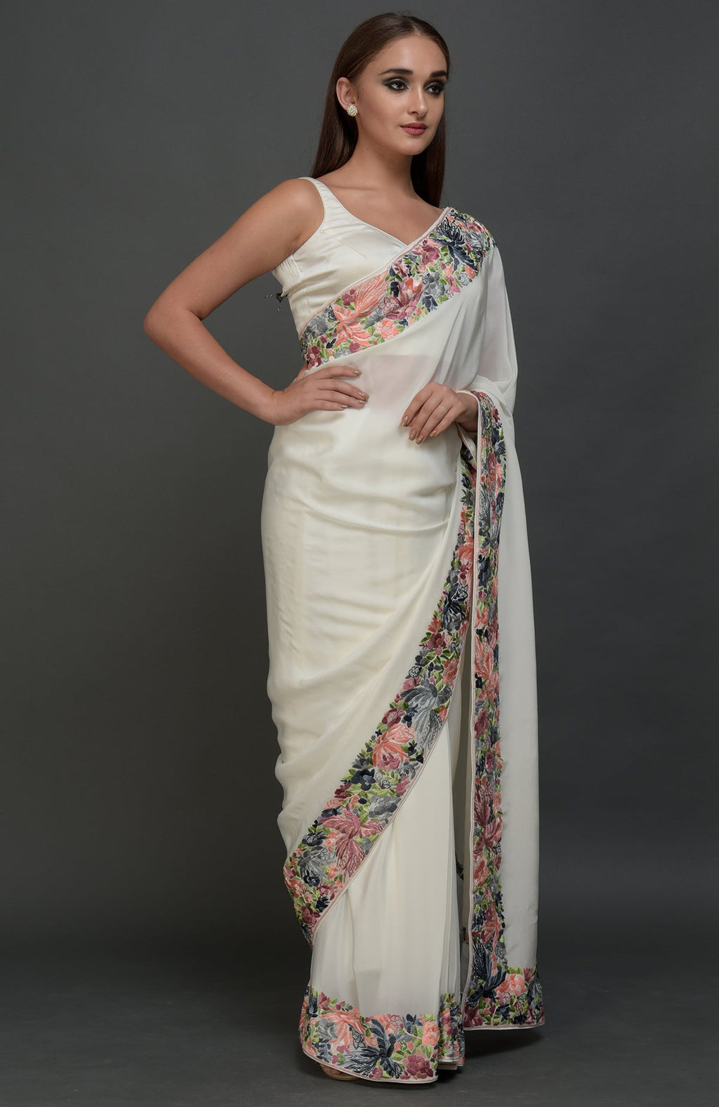 Ivory Parsi Gara hand embroidered saree with floral borders.