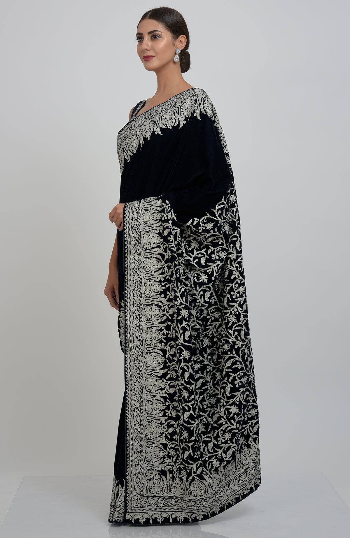 Midnight blue velvet saree with Kashmiri silver tilla aari embroidery.