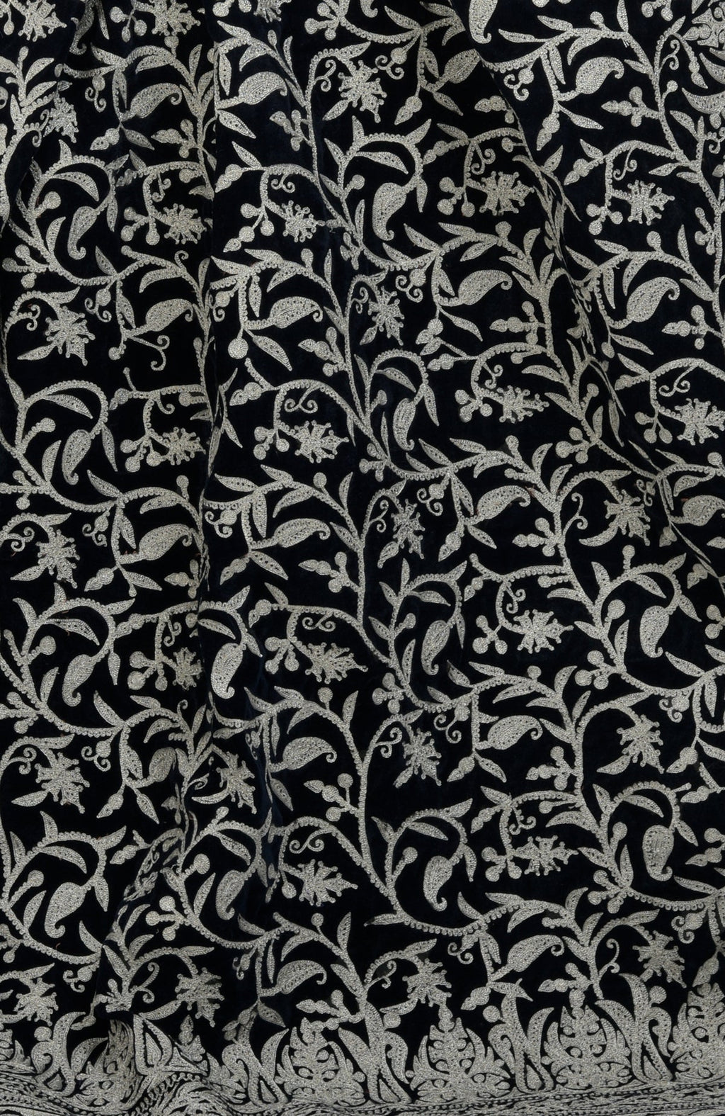 Midnight blue velvet saree with intricate silver tilla aari embroidery.