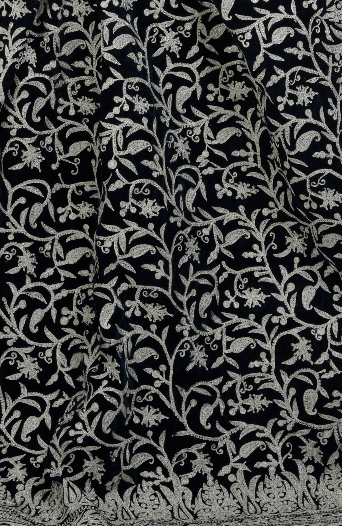 Midnight blue velvet saree with intricate silver tilla aari embroidery.