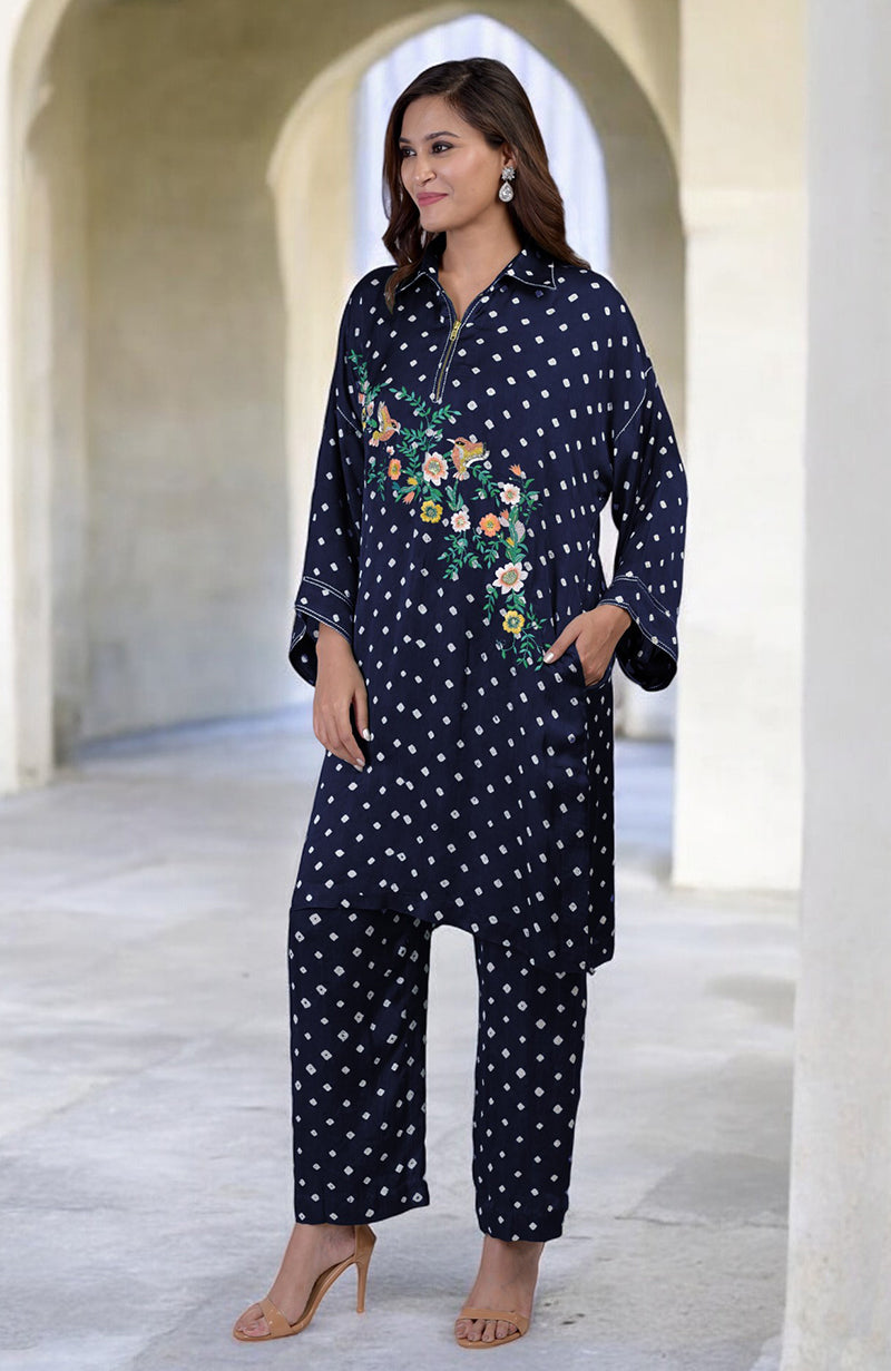 Navy blue bandhej co-ord set with multi-color floral embroidery and matching pants.
