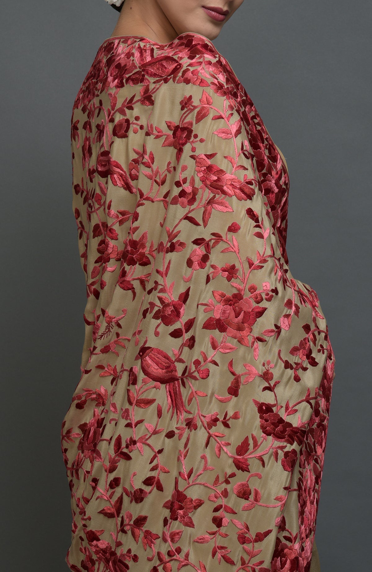 Beige Parsi Gara hand embroidered saree with floral and bird motifs.
