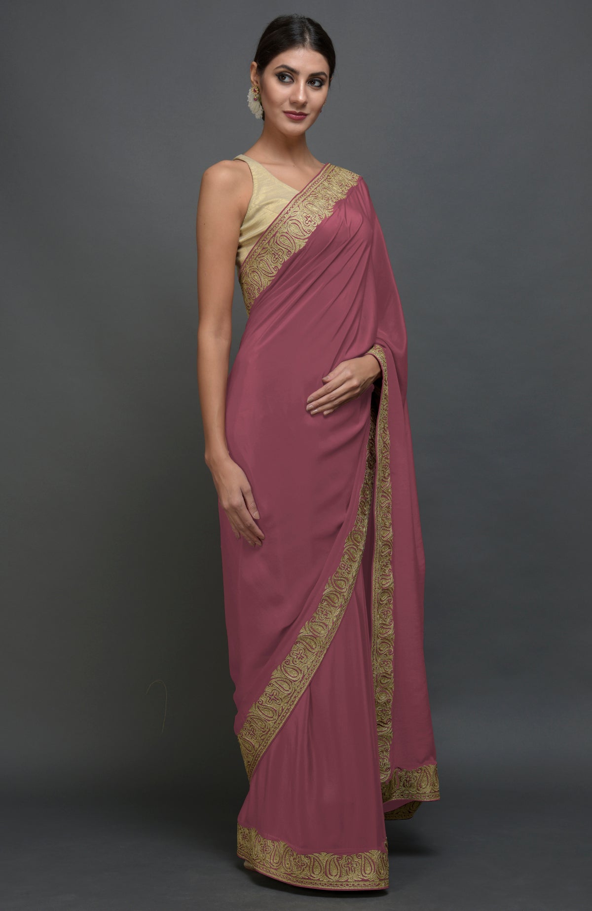 China rose pure crepe saree with gold paisley tilla aari embroidered borders.