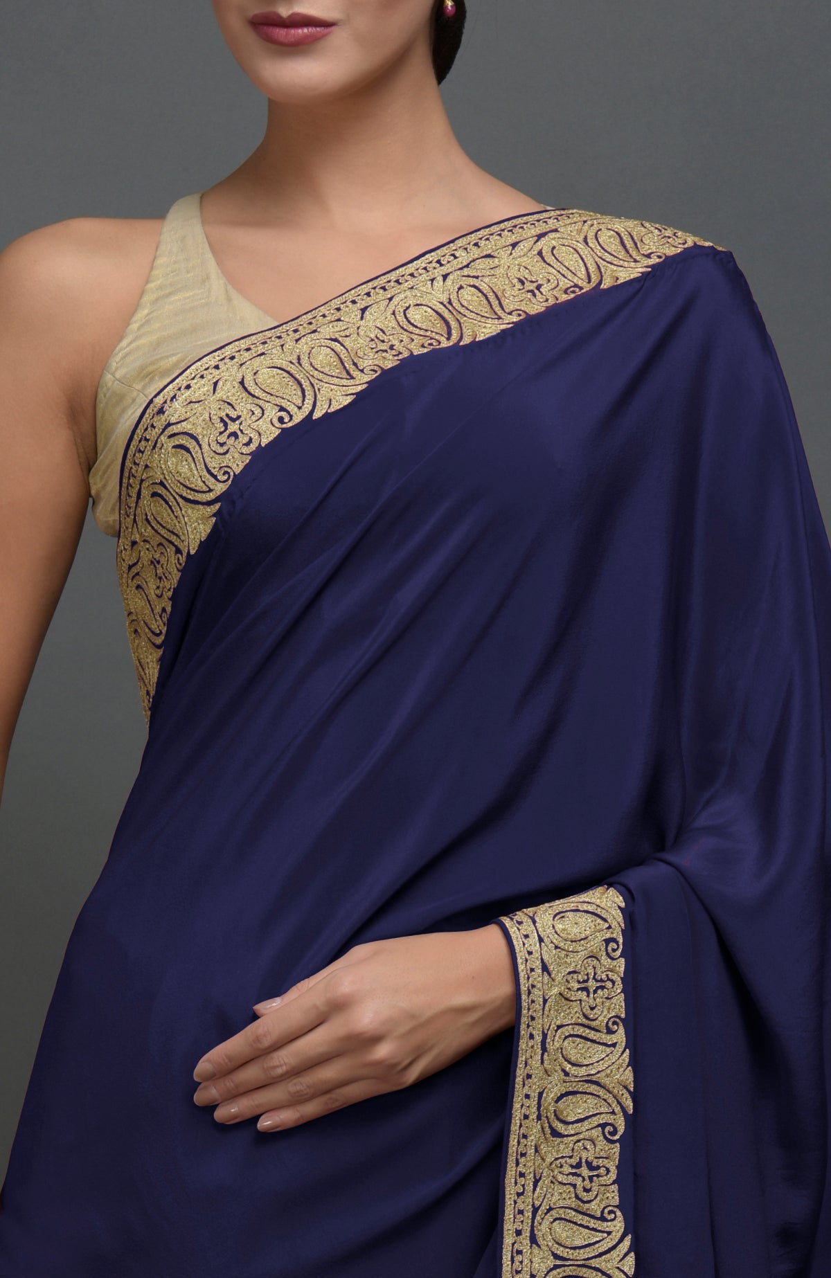 Navy blue pure crepe saree with gold Kashmiri tilla aari embroidered paisley borders.