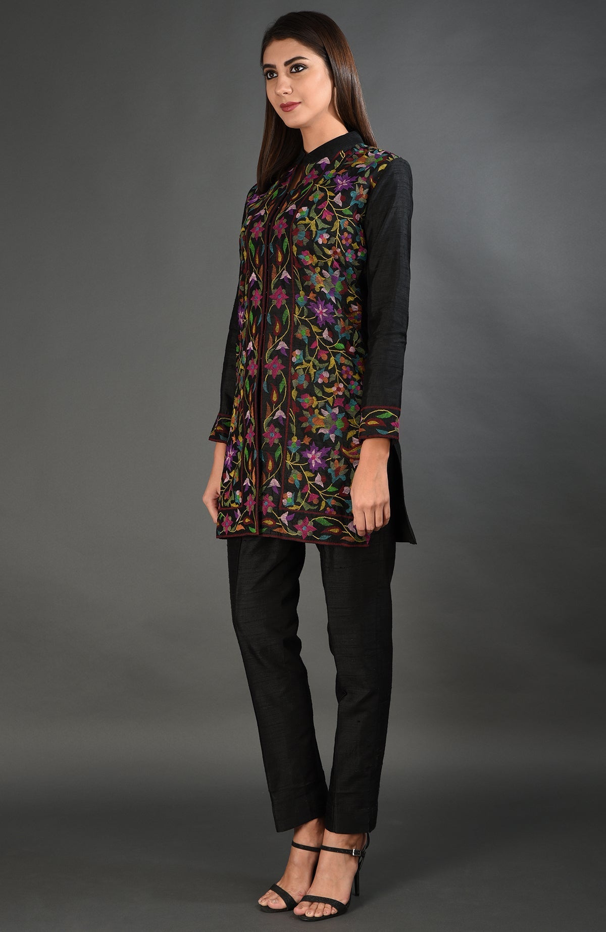 Black raw silk jacket with colorful floral Kani art embroidery.