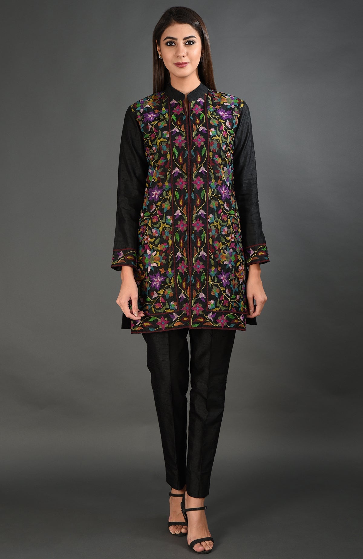 Black Kashmir Kani Art embroidered jacket with colorful floral patterns.