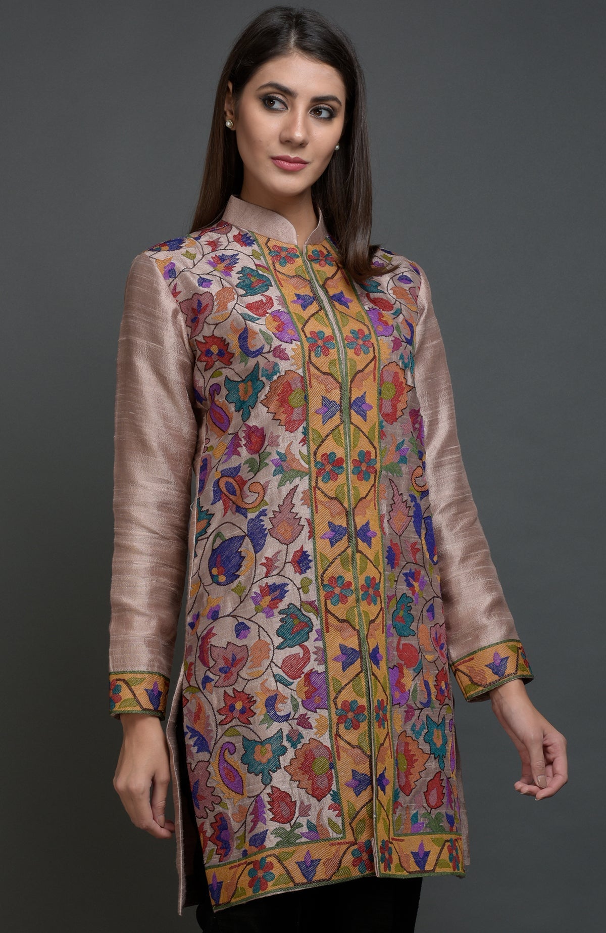 Rosy brown jacket with colorful floral and paisley embroidery.