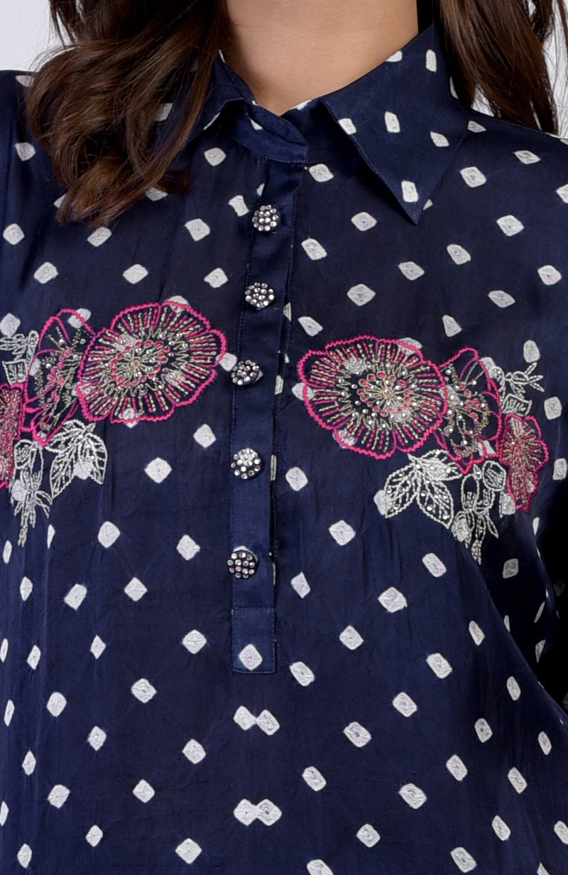 Navy blue bandhej co-ord set with floral embroidery and decorative buttons.
