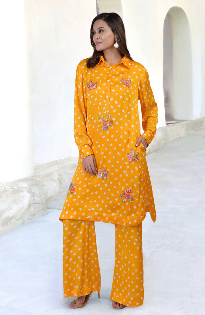 Turmeric yellow bandhej co-ord set with floral embroidery.